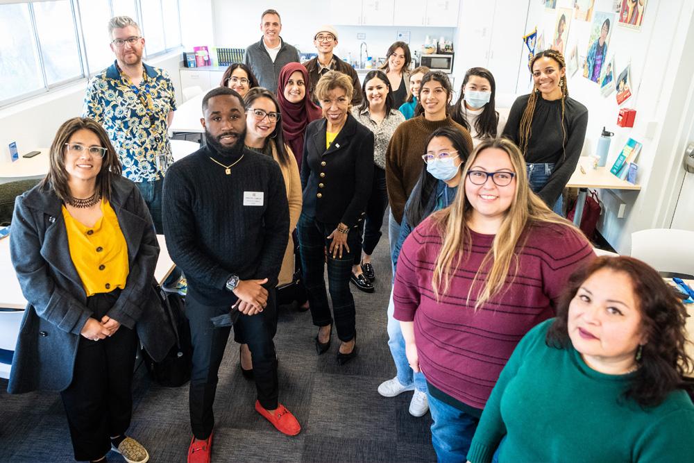 The president posing with College of Education students.